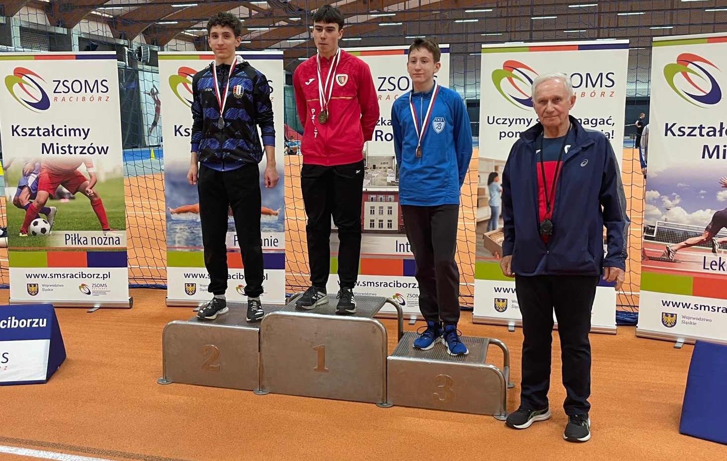 Maksymilian Karkus na podium